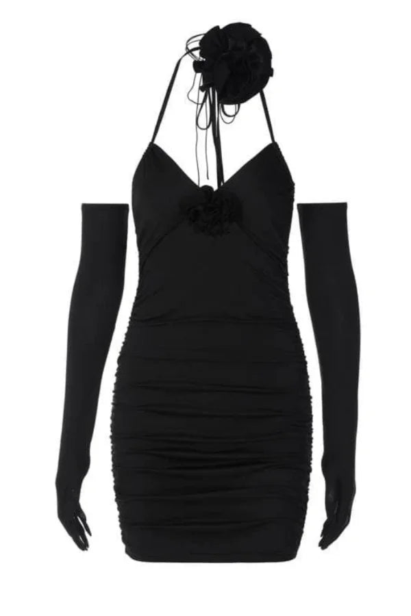 Model wearing Kouvr Fashion Chanti Bloom black ruched mini dress with matching opera gloves and rosette choker