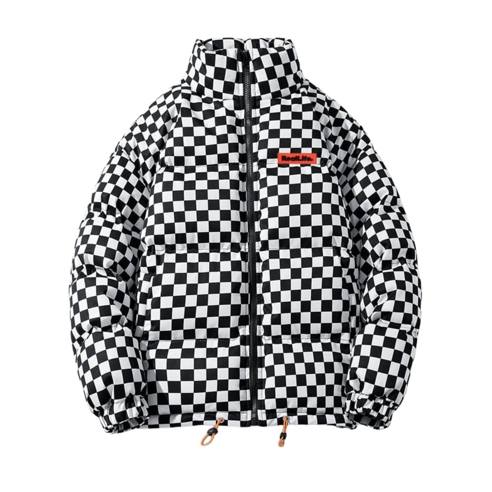 Model wearing the Kouvr Fashion Grid checkerboard puffer jacket with a black turtleneck