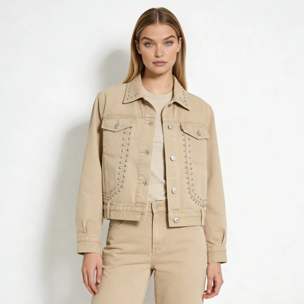 Model wearing the Kouvr Fashion Jacklyn Studded Western Trucker Jacket in khaki, showing the front stud detailing and classic fit.