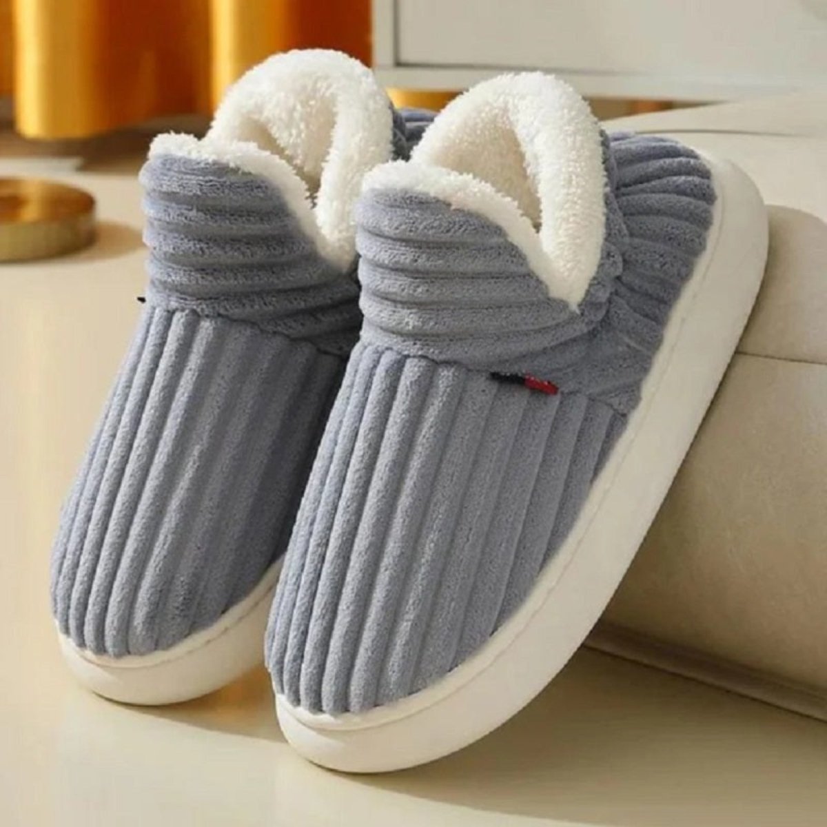 A pair of Gray Jasmine corduroy slipper boots by Kouvr Fashion, highlighting the wide-wale texture and plush sherpa collar.