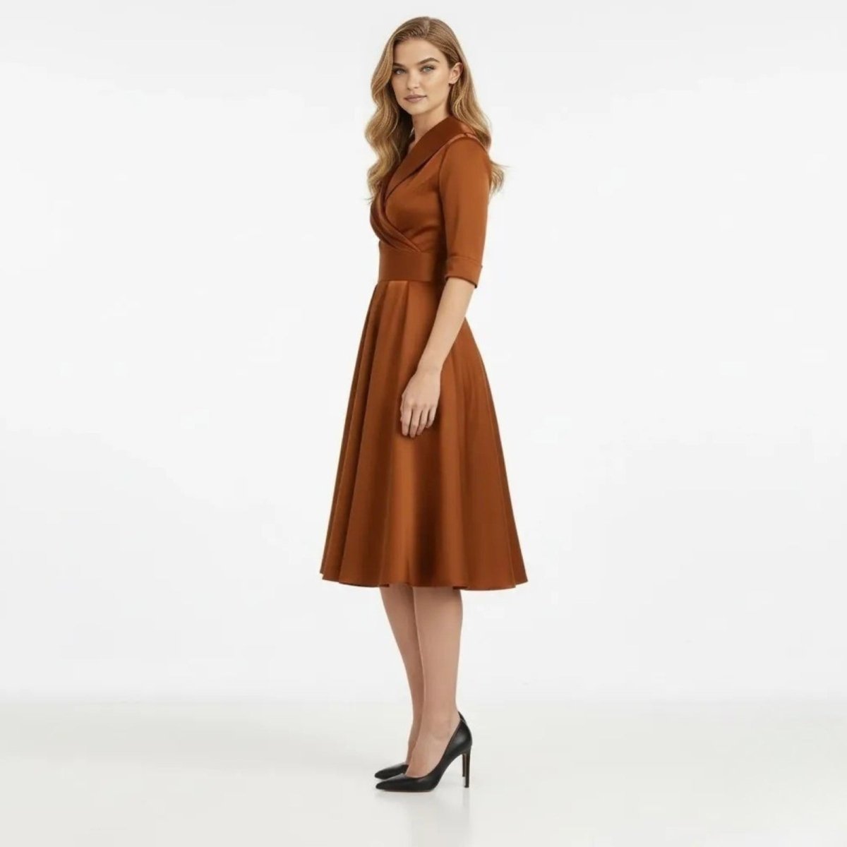 Model in a side profile view showcasing the A-line silhouette of the Kouvr Fashion jenner brown satin midi dress.