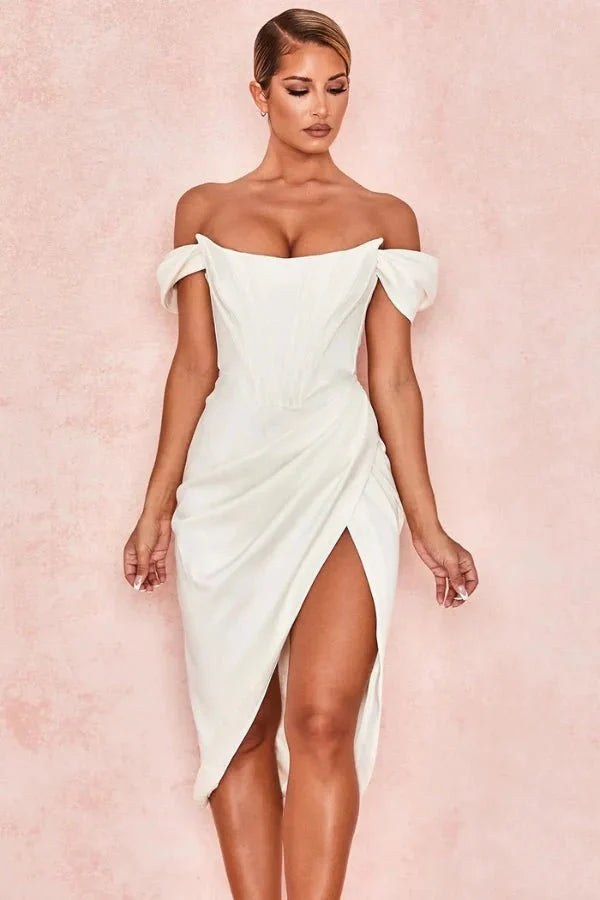 structured bodice, asymmetrical hemline, sweetheart neckline, sculpted silhouette, boning, and figure-flattering