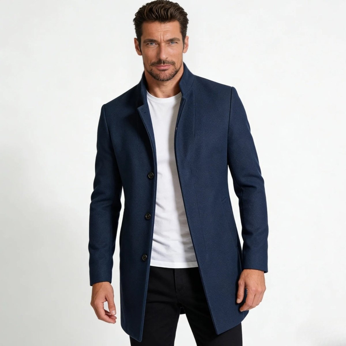 Model wearing the Kouvr Fashion men's blue wool stand collar overcoat with a white t-shirt and black trousers.
