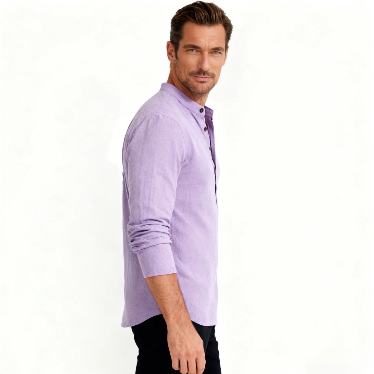 Side profile of a male model wearing the tailored-fit Kouvr Fashion lavender Roby shirt, highlighting the sleeve and fit.
