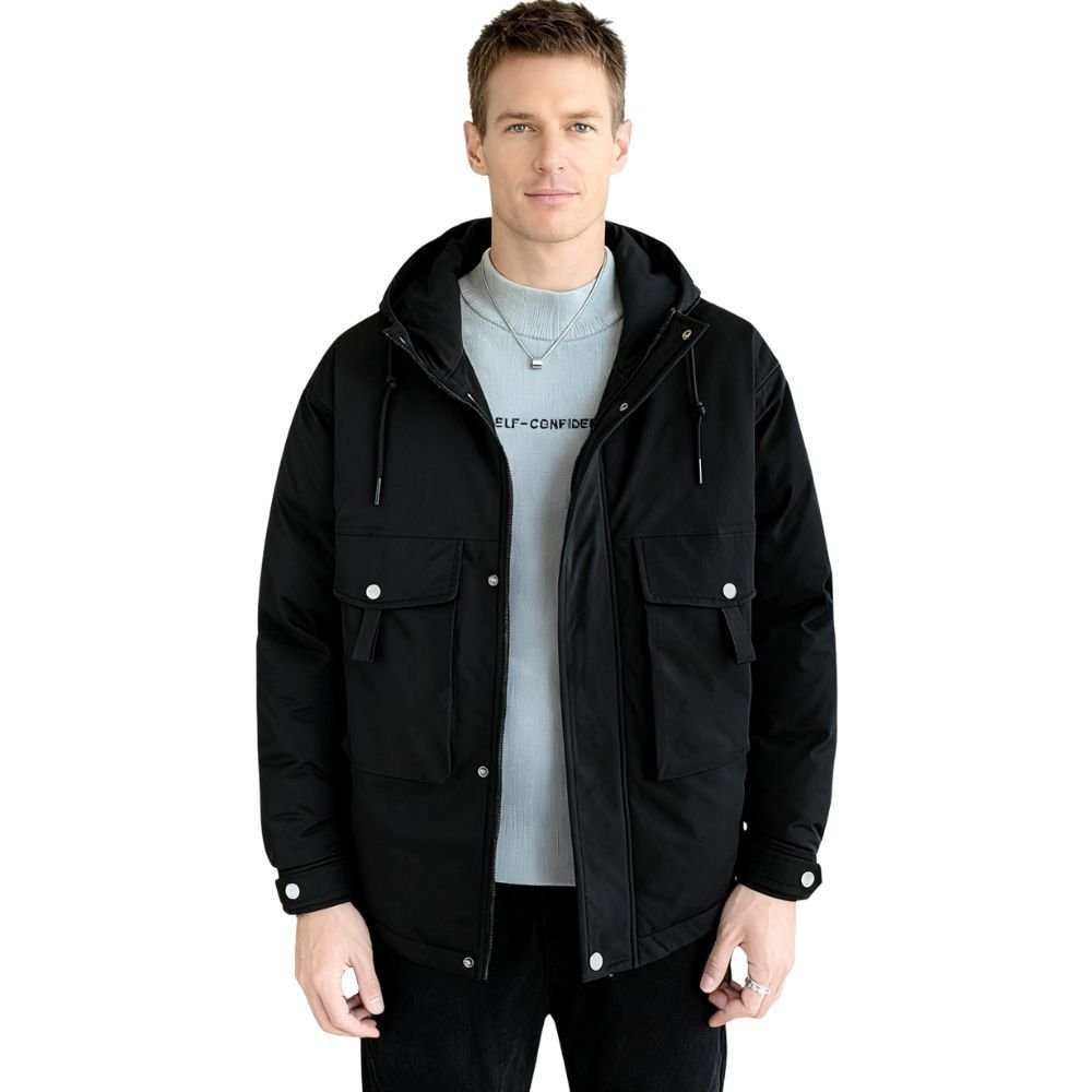 Man wearing a black kouvr jacket on a white background