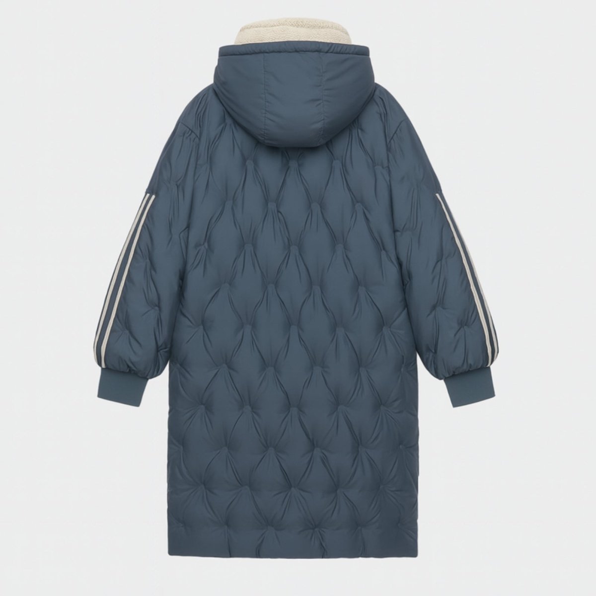 Product shot of the back of the Kouvr Fashion Meridian parka, detailing the full diamond-quilted pattern and hood construction.