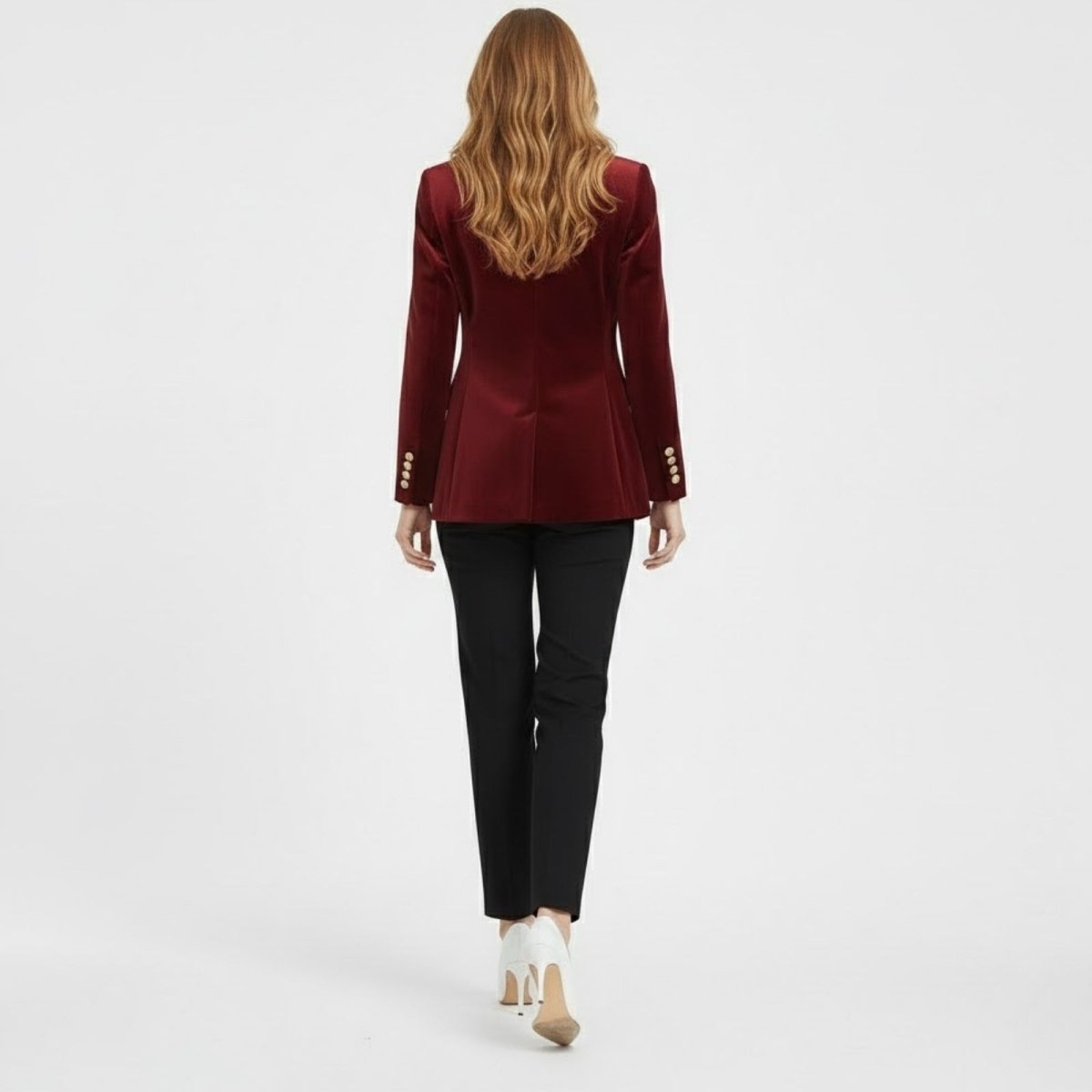 Back view of the Kouvr Fashion red velvet blazer for women, showcasing the clean lines and single back vent.
