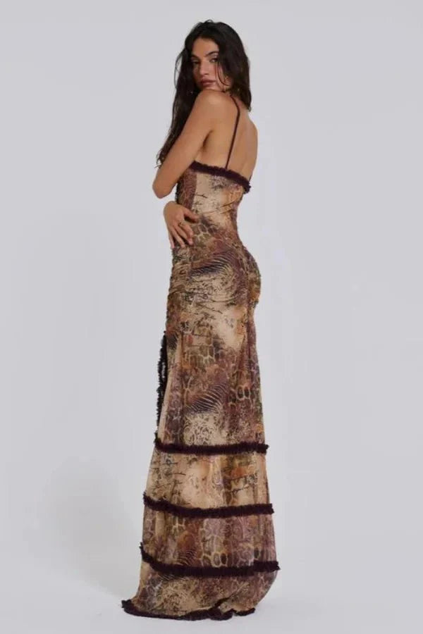 Naturally weave in semantic terms like "serpentine print," "keyhole gown," "sheer evening dress," "Y2K aesthetic," "ruffle trim," and "high slit dress