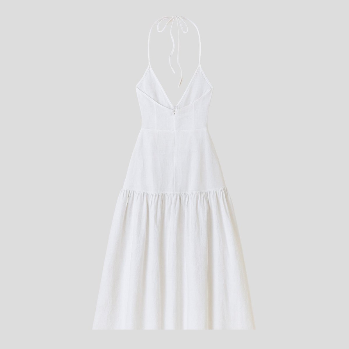White dress on a light gray background