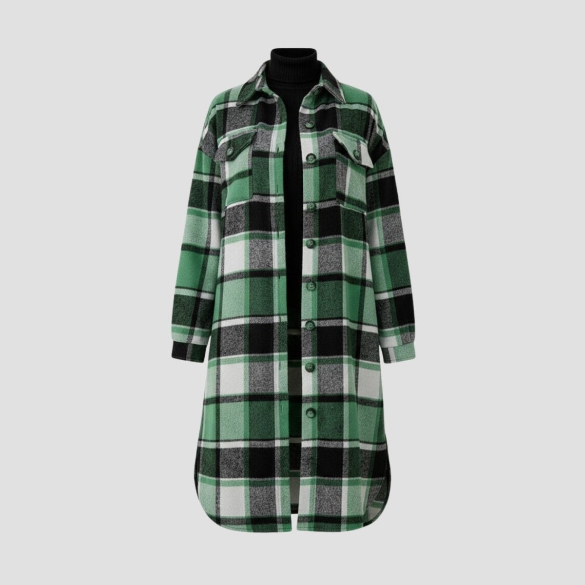 Flat lay of the Kouvr green plaid long shacket showing the front button placket, collar, and chest pockets against a light grey background.