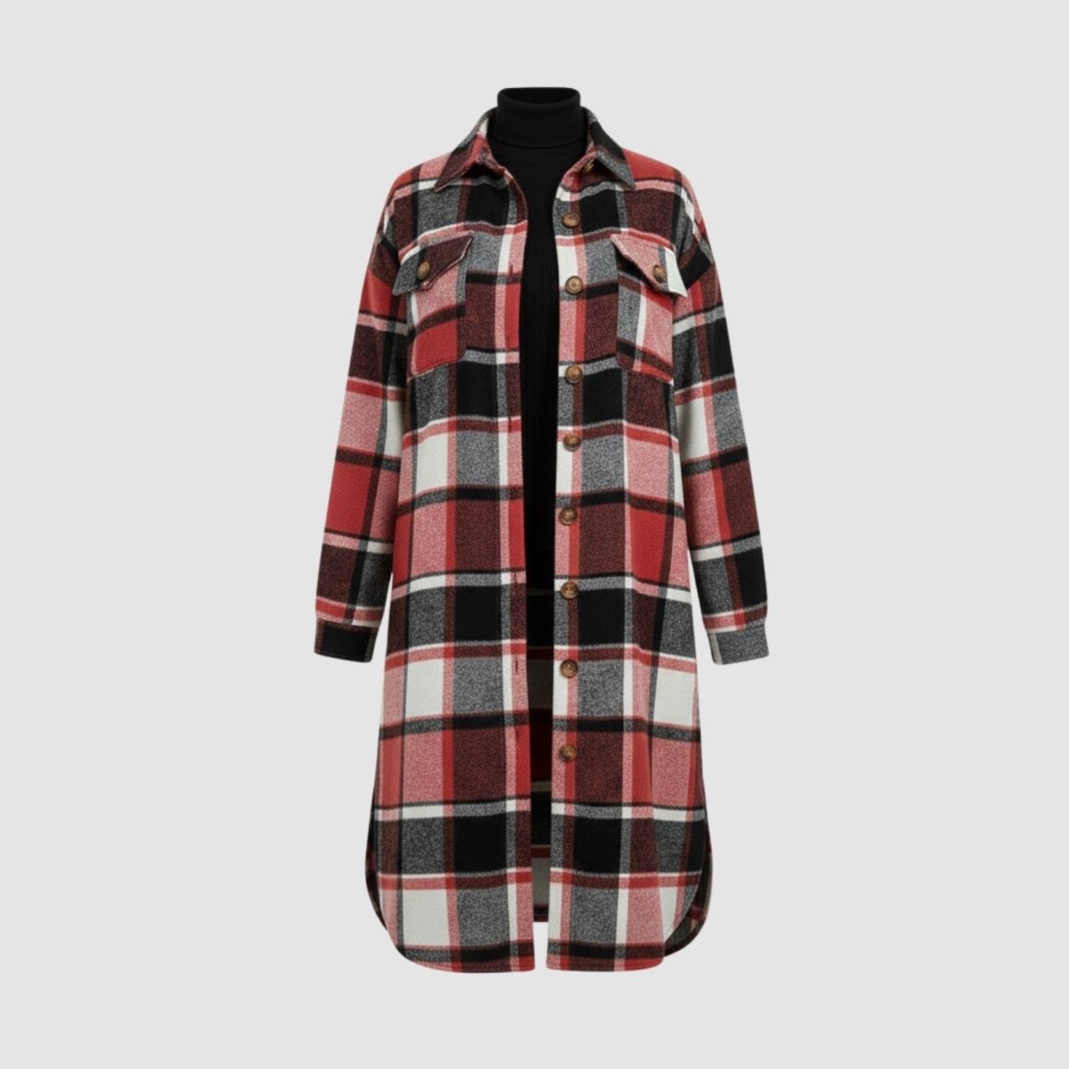 Flatlay product shot of the Janet long plaid shacket, buttoned up, showing the full length, chest pockets, and red and black pattern against a light grey background.
