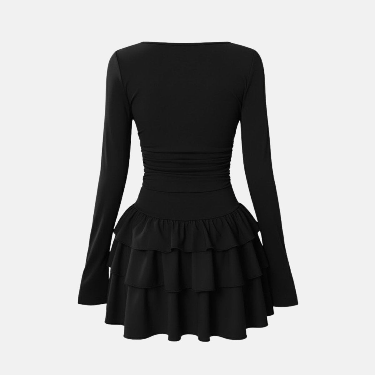 Flatlay of the Kouvr Leona black tiered ruffle mini dress showing ruched waist detail from the back.