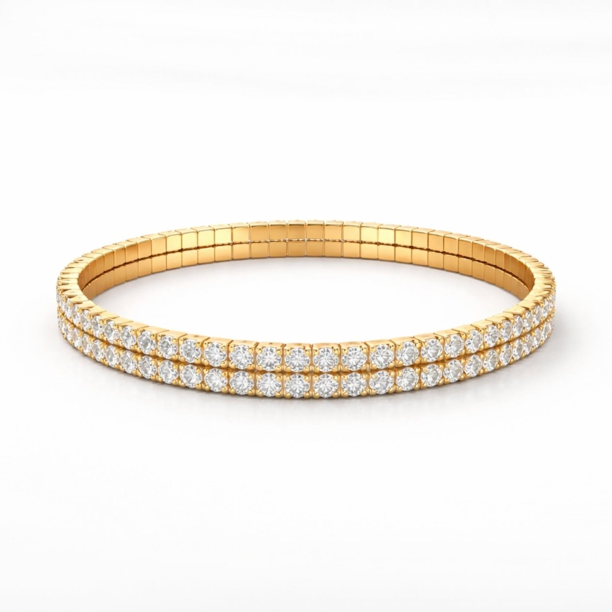 The Kouvr Marzanna double row gold and crystal stretch tennis bracelet shown on a clean white background. 