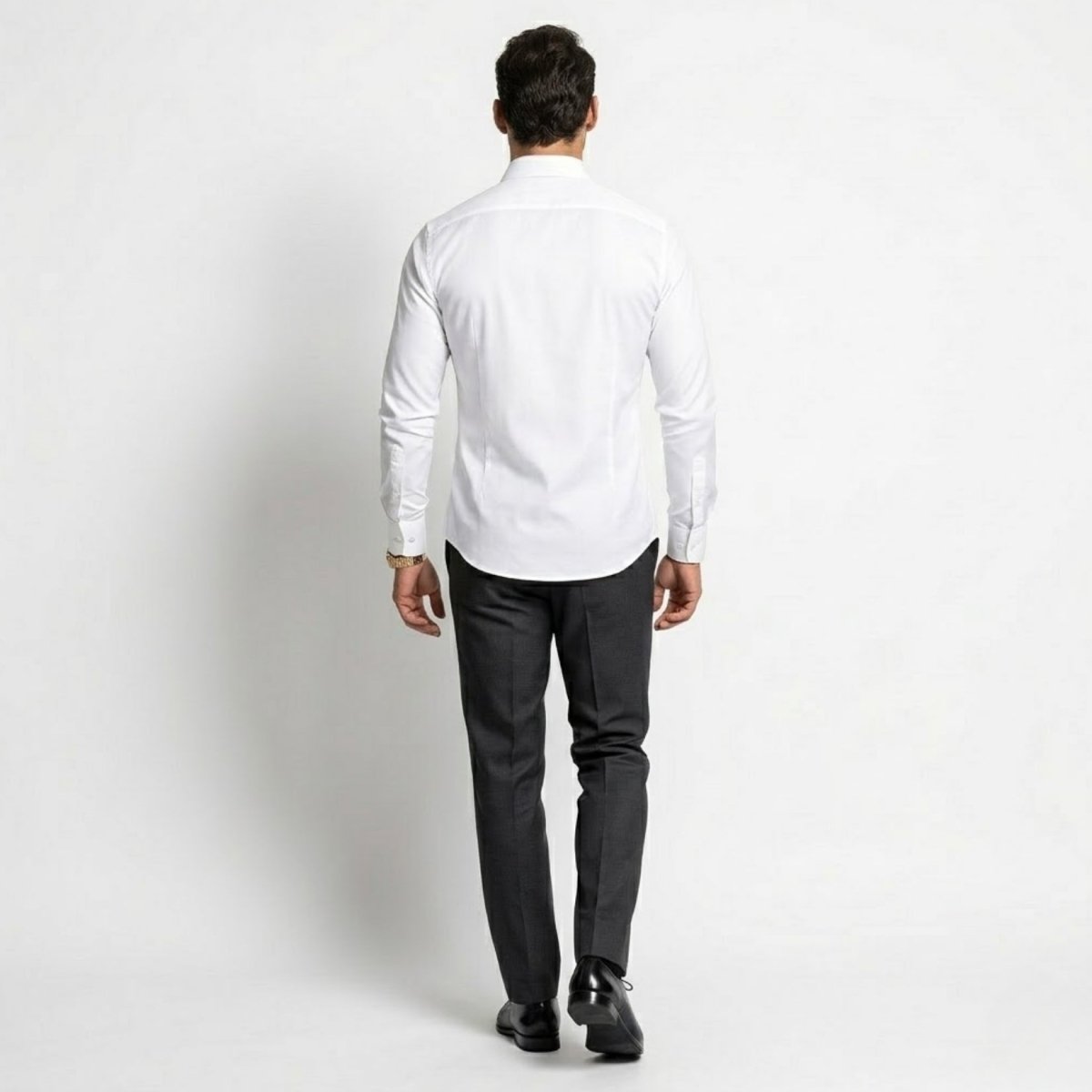 Back view of man wearing Kouvr white tailored business shirt showcasing the clean shoulder yoke