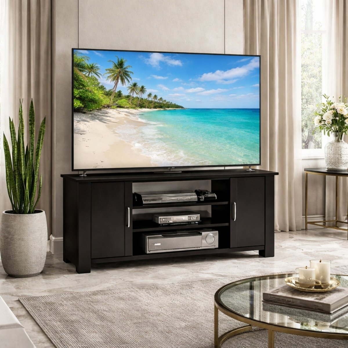 Full room view of the Kouvr modern TV cabinet with storage, positioned between a large snake plant and a glass coffee table.