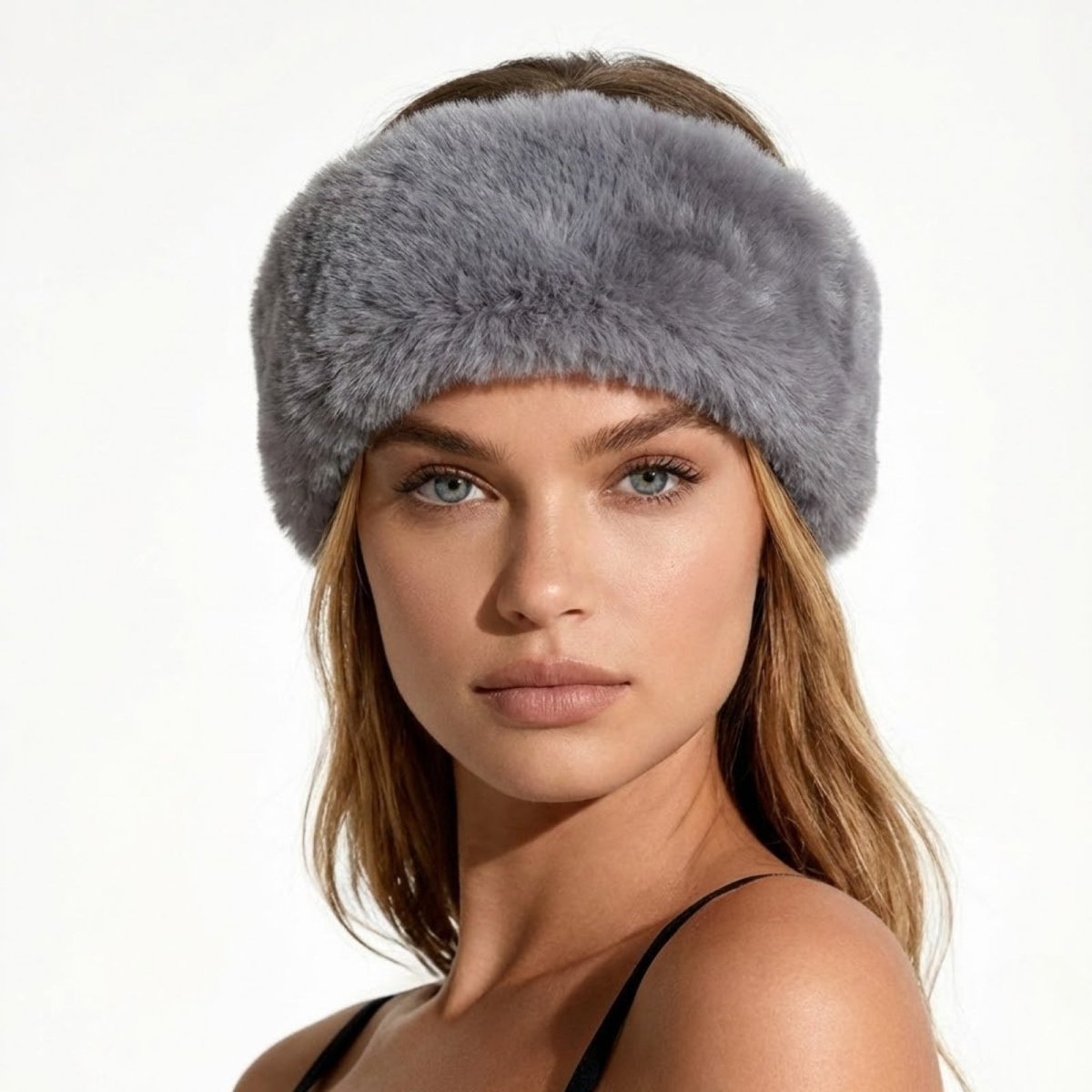 Model looking forward wearing the Kouvr Nancie luxe grey faux fur headband.