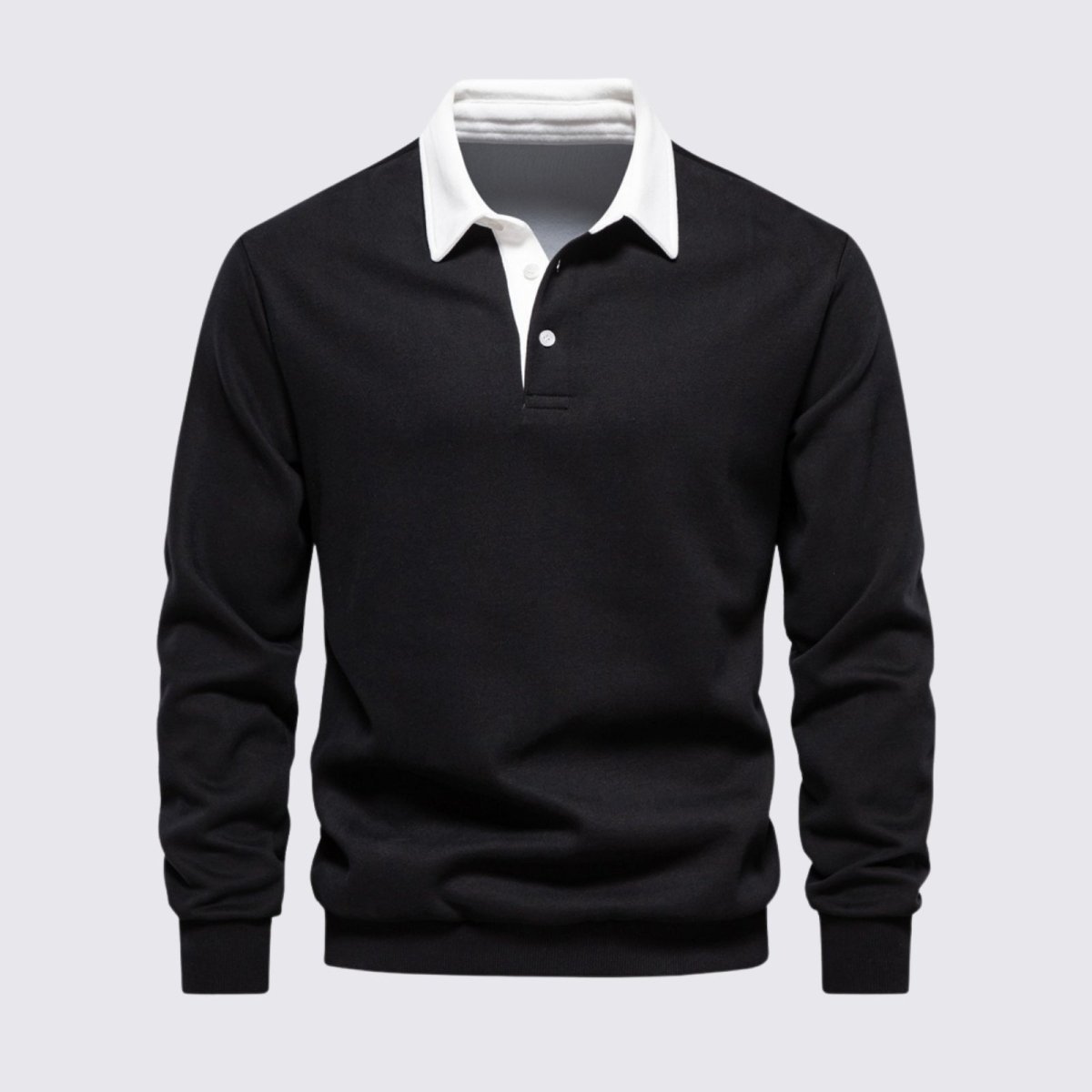Flat product shot of the Kouvr Rhodes black long sleeve knit polo with a white collar, showing the texture of the fabric and button placket.