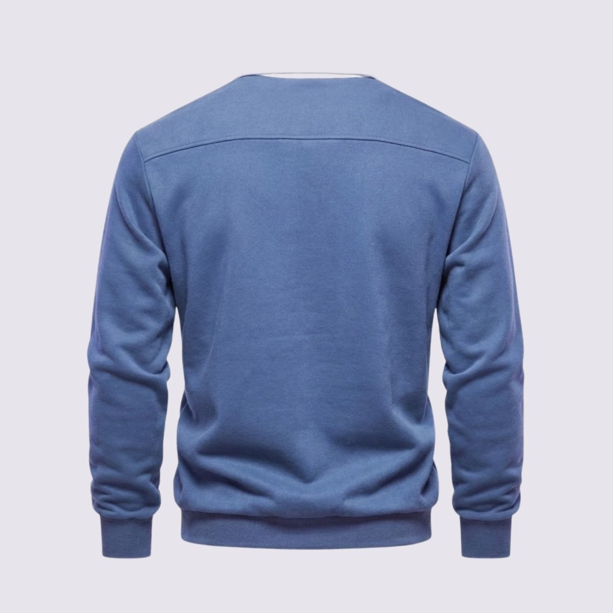 Flat lay back view of the steel blue Kouvr Rhodes polo sweater, detailing the horizontal back yoke and premium knit texture.