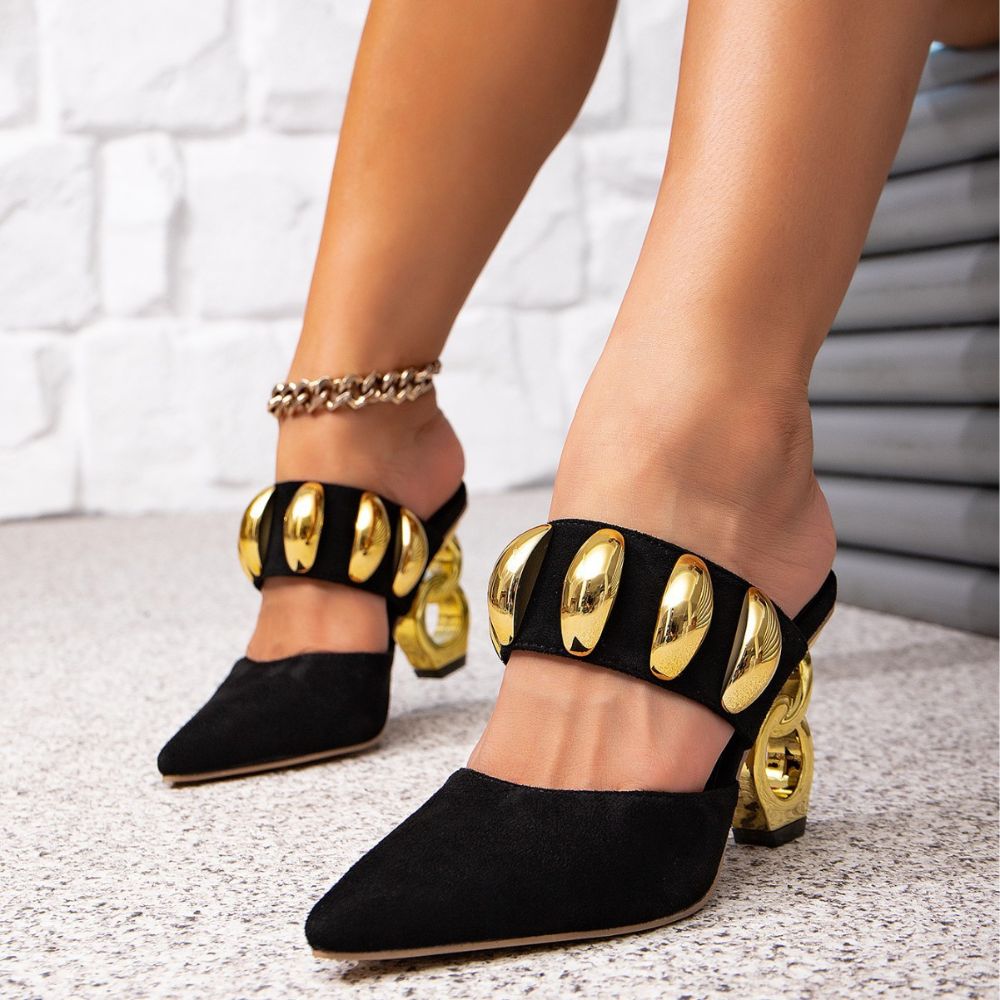 Side profile of Kouvr Sculptural Chain Heel Mules in Black Suede