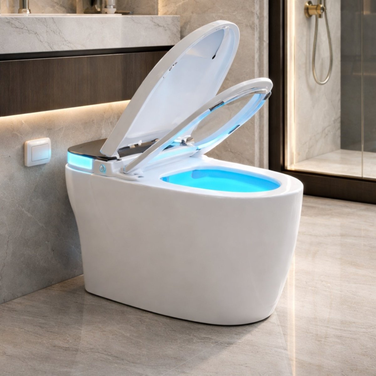 The Kouvr smart toilet in a luxury marble bathroom with its lid and seat automatically open, revealing a soft blue LED light illuminating the bowl.