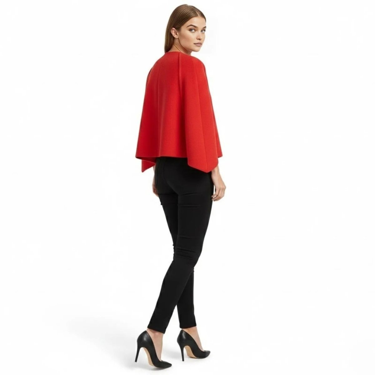 Back view of the Kouvr women's red statement cape jacket, highlighting its clean lines and tailored fit.