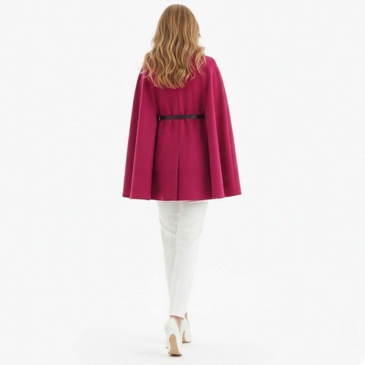 Back view of the Kouvr pink wool-blend cape, highlighting the central pleat detail and removable black belt.
