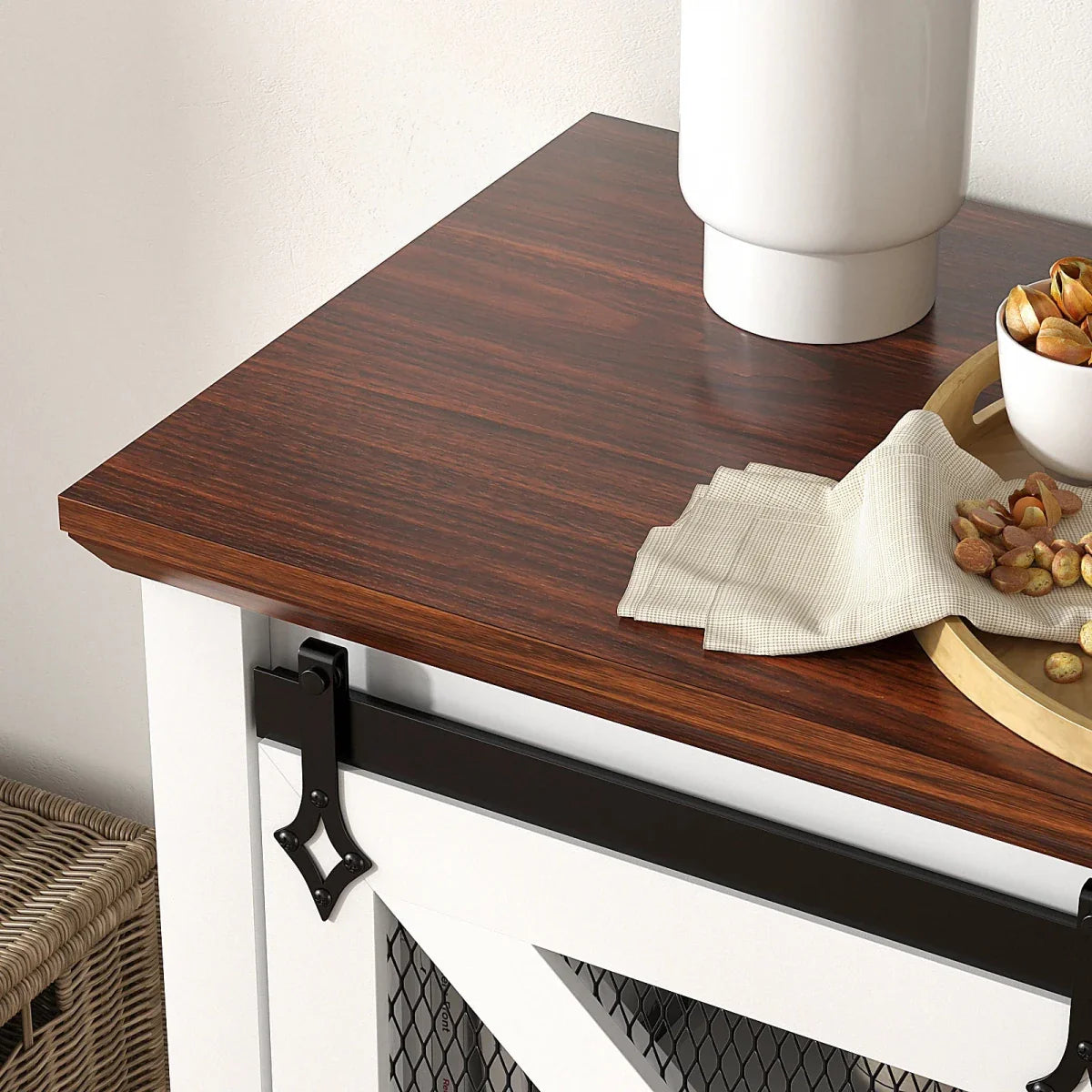A close-up shot of the rich, dark walnut wood-grain finish on the top surface of the Kouvr farmhouse TV stand.
