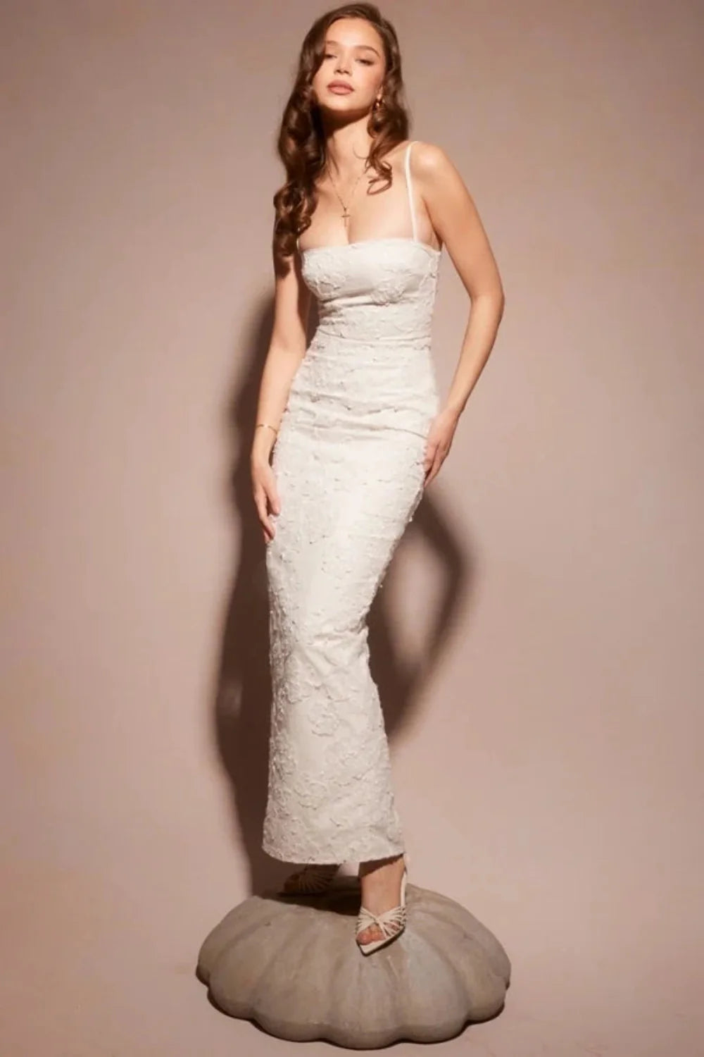 sculptural silhouette," "couture detailing," "ethereal elegance," "minimalist bride," "civil ceremony attire," and "rehearsal dinner outfit