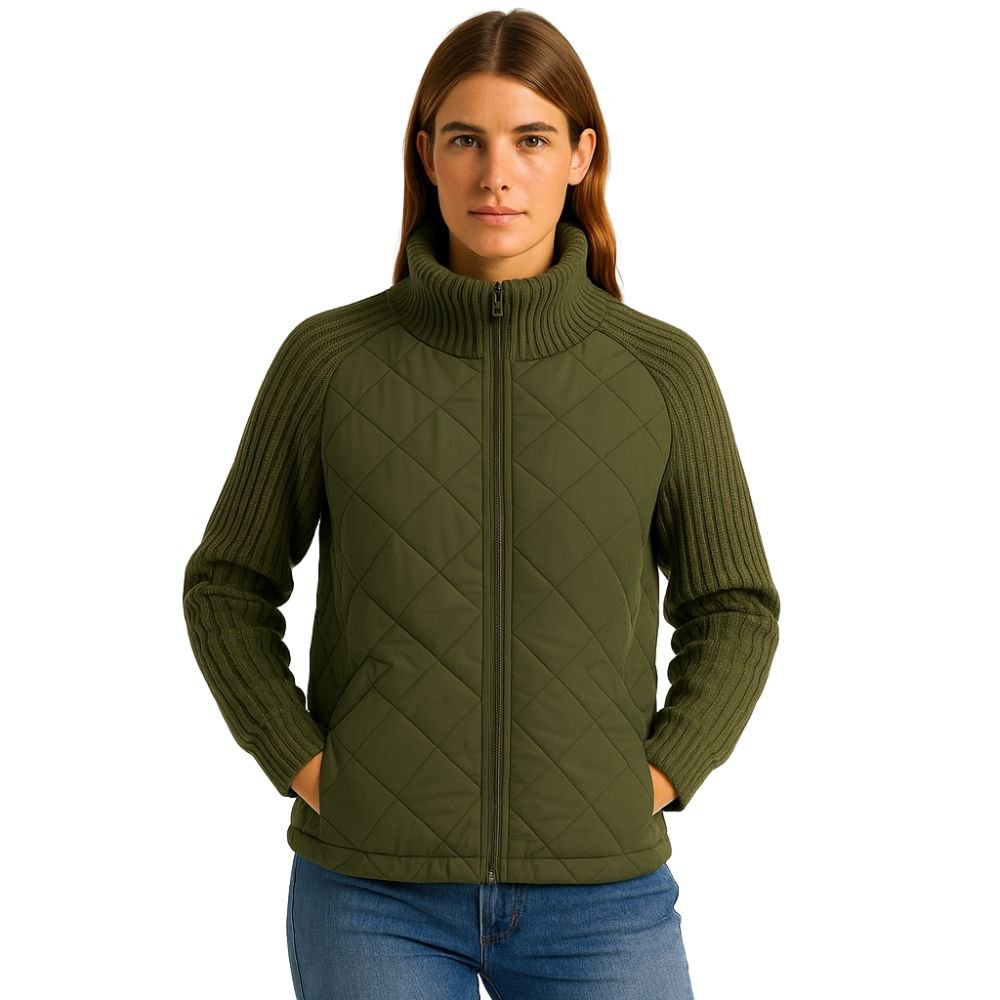 Woman wearing the Kouvr Mika women's quilted hybrid jacket in army green with knit sleeves, front view.
