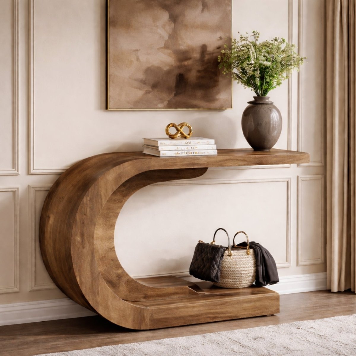 A Kouvr C-shaped console table styled with decorative objects on both the top and bottom shelves, demonstrating its 2-tier functionality.